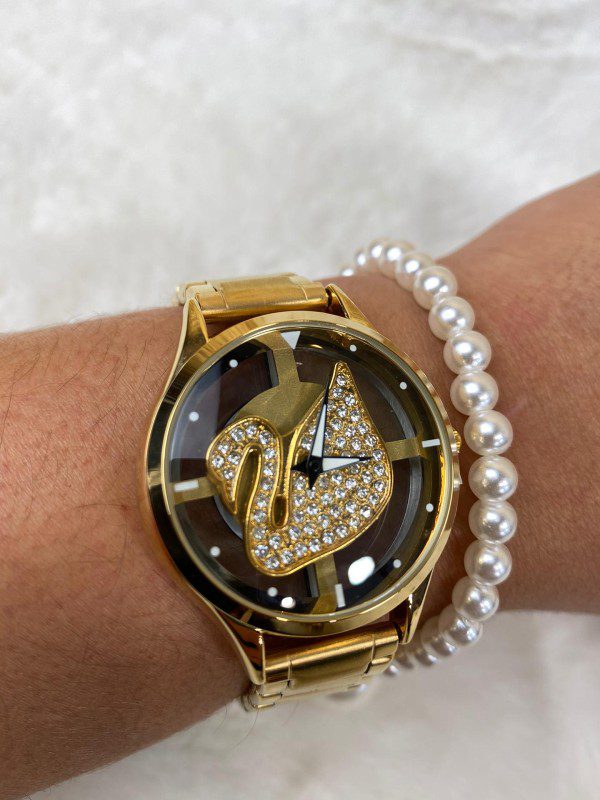 Relógio swan rotativo + oferta de uma pulseira